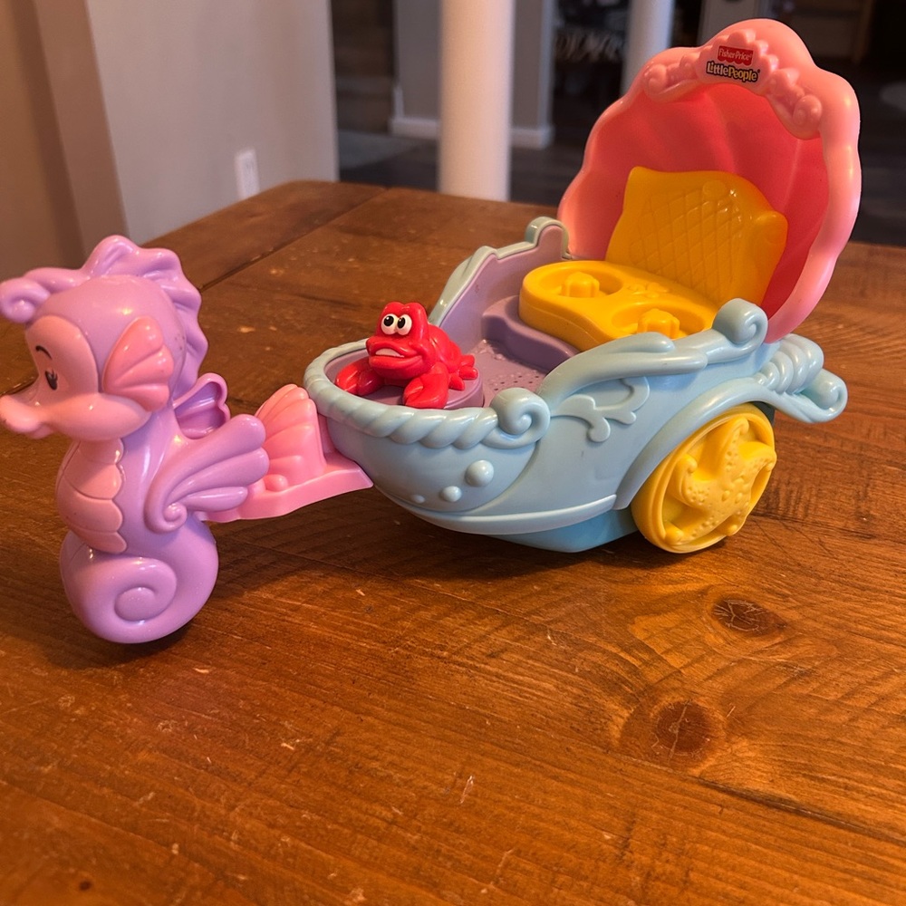 Fisher Price Little People Ariel’s carriage as is. Does NOT work